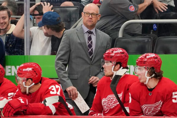 Detroit Red Wings head coach Jeff Blashill watches during the third period of an NHL preseason hockey game against the Chicago Blackhawks, Monday, Oct. 4, 2021, in Detroit. (AP Photo/Paul Sancya, File)