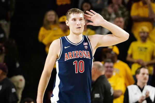 Arizona's Azuolas Tubelis (10) taunts fans after a win over Arizona State in an NCAA college basketball game, Saturday, Dec. 31, 2022, in Tempe, Ariz. (AP Photo/Darryl Webb)
