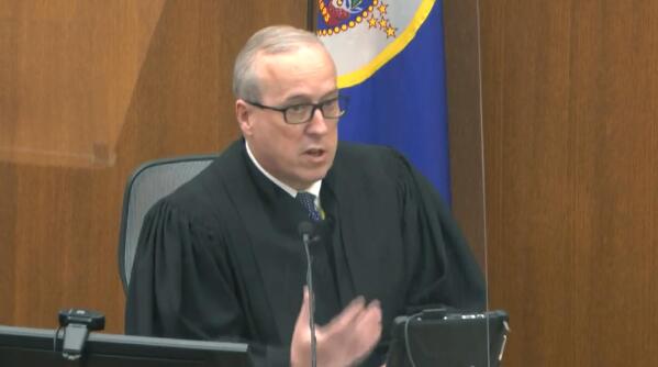 In this image from video, Hennepin County Judge Peter Cahill reads instructions to the jury before closing arguments, Monday, April 19, 2021, in the trial of former Minneapolis police officer Derek Chauvin at the Hennepin County Courthouse in Minneapolis. Chauvin is charged in the May 25, 2020 death of George Floyd. (Court TV via AP, Pool)