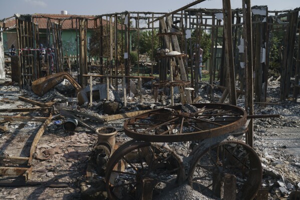 Destroyed property is seen at Kibbutz Netiv Haasara near the border with the Gaza Strip, Israel, Friday, Nov. 17, 2023. The kibbutz was attacked during the violent Hamas cross-border rampage on Oct. 7 that killed many members of its community. (AP Photo/Leo Correa)