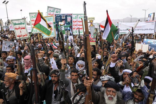 Houthi supporters chant slogans during a weekly, anti-U.S. and anti-Israel rally in Sanaa, Yemen, Friday, April 18, 2025. (AP Photo/Osamah Abdulrahman)