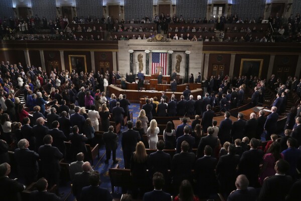 Members recite the Pledge of Allegiance as the House of Representatives meets to elect a speaker and convene the new 119th Congress at the Capitol in Washington, Friday, Jan. 3, 2025. (AP Photo/Jacquelyn Martin)