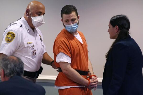 Joseph Stapf, 31, is escorted into a courtroom for a plea hearing in Hillsborough County Court, Thursday, Sept. 29, 2022, in Nashua, N.H. Stapf, who was held since 2021 in connection to the disappearance of five-year-old Elijah Lewis, plead guilty to manslaughter and other charges in the child's death. (AP Photo/Charles Krupa)