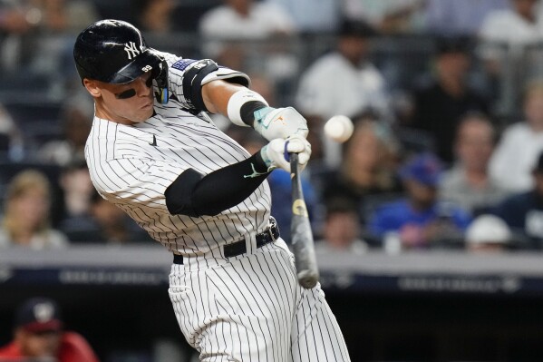 New York Yankees' Aaron Judge hits a home run against the Washington Nationals during the seventh inning of a baseball game Wednesday, Aug. 23, 2023, in New York. (AP Photo/Frank Franklin II)