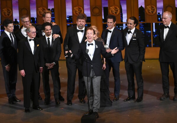 Jeffrey Seller, center, producer of the Broadway musical "Hamilton" accepts the award for best musical at the Tony Awards in New York on June 12, 2016. (Photo by Evan Agostini/Invision/AP, File)