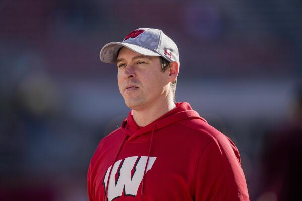 Wisconsin interim head coach Jim Leonhard on the field before an NCAA football game between against Wisconsin and Minnesota Saturday, Nov. 26, 2022, in Madison, Wis. (AP Photo/Andy Manis)