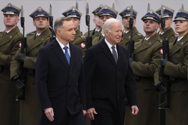 FILE - Polish President Andrzej Duda, left, welcomes President Joe Biden at the Presidential Palace in Warsaw, Ukraine, Tuesday, Feb. 21, 2023. The Biden administration announced Monday, Sept. 25, that it is offering a $2 billion loan to Poland, which has been a hub for weapons going into Ukraine, to support the ally's defense modernization. (AP Photo/Czarek Sokolowski, File)