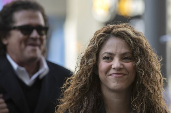 FILE - In this Wednesday, March 27, 2019 file photo, Colombian performer Shakira arrives at court in Madrid, Spain. Pop music star Shakira is appearing in court Thursday June 6, 2019, for alleged tax evasion in Spain between 2012 and 2014. (AP Photo/Bernat Armangue, File)