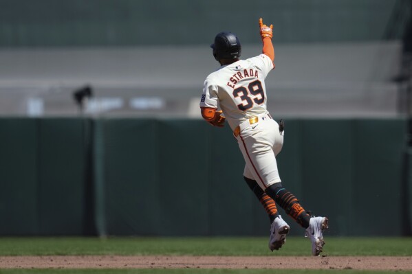 San Francisco Giants' Thairo Estrada runs the bases after hitting a solo home run against the Pittsburgh Pirates during the third inning of a baseball game Sunday, April 28, 2024, in San Francisco. (AP Photo/Godofredo A. Vásquez)