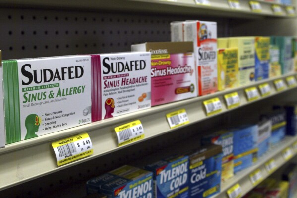 FILE - Sudafed and other common nasal decongestants containing pseudoephedrine are on display behind the counter at Hospital Discount Pharmacy in Edmond, Okla., Jan. 11, 2005. On Tuesday, Sept. 12, 2023 advisers to the Food and Drug Administration said that a different ingredient, phenylephrine, is ineffective at relieving nasal congestion. Drugmakers reformulated their products with phenylephrine after a 2006 law required pseudoephedrine-containing medications be sold from the behind pharmacy counter. (AP Photo, File)