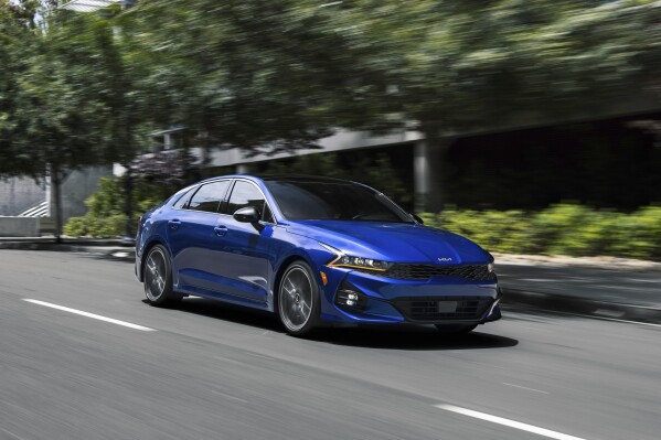This photo provided by Kia shows the 2024 Kia K5, a midsize sedan with sporty looks that has been one of Edmunds' top-rated vehicles. (Robin Trajano/Courtesy of Kia America via AP)