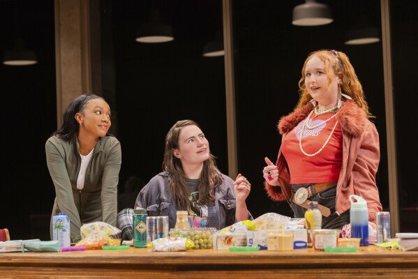 Alyah Chanelle Scott,from left, Kathryn Gallagher and Julie Lester appear in a scene from "All Nighter" in New York. (Evan Zimmerman/MurphyMade via AP)