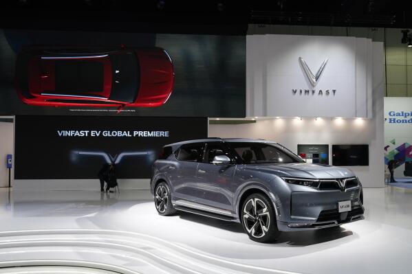 FILE - The VinFast VF e36 is shown at the AutoMobility LA auto show Thursday, Nov. 18, 2021, in Los Angeles.  VinFast announced plans Tuesday, March 29, 2022, to build a plant in North Carolina to manufacture electric vehicles, promising to bring 7,500 jobs.   (AP Photo/Marcio Jose Sanchez, File)