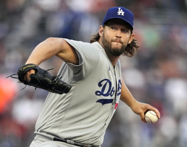 Clayton Kershaw staying with Dodgers for 17th season and could pitch in  second half of '24 | AP News