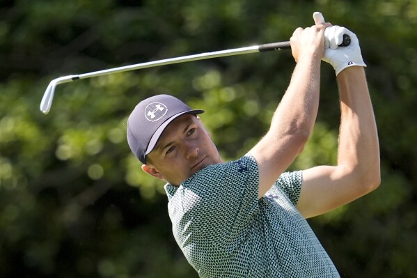 Jordan Spieth watches his tee shot on the 15th hole during the second round of the U.S. Open golf tournament Friday, June 14, 2024, in Pinehurst, N.C. (AP Photo/George Walker IV)