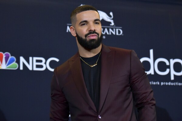 FILE - Drake poses at the Billboard Music Awards in Las Vegas on May 1, 2019. Drake says his new album, “For All the Dogs,” may drop in a couple of weeks. His announcement came during a tour stop at the sold-out Barclays Center Thursday night in the Brooklyn borough of New York. (Photo by Richard Shotwell/Invision/AP, File)