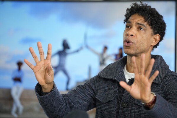 International ballet superstar Carlos Acosta speaks at a presentation for media about his brand-new production 'Nutcracker in Havana' at the Carlos Acosta Dance Studios in London, Monday, March 4, 2024. Nutcracker in Havana will have its world premiere on Nov. 1, 2024 at Norwich Theatre Royal, before embarking on a UK tour including a week at London's Southbank Centre in Dec. 2024, with further venues to be announced. (AP Photo/Kirsty Wigglesworth)