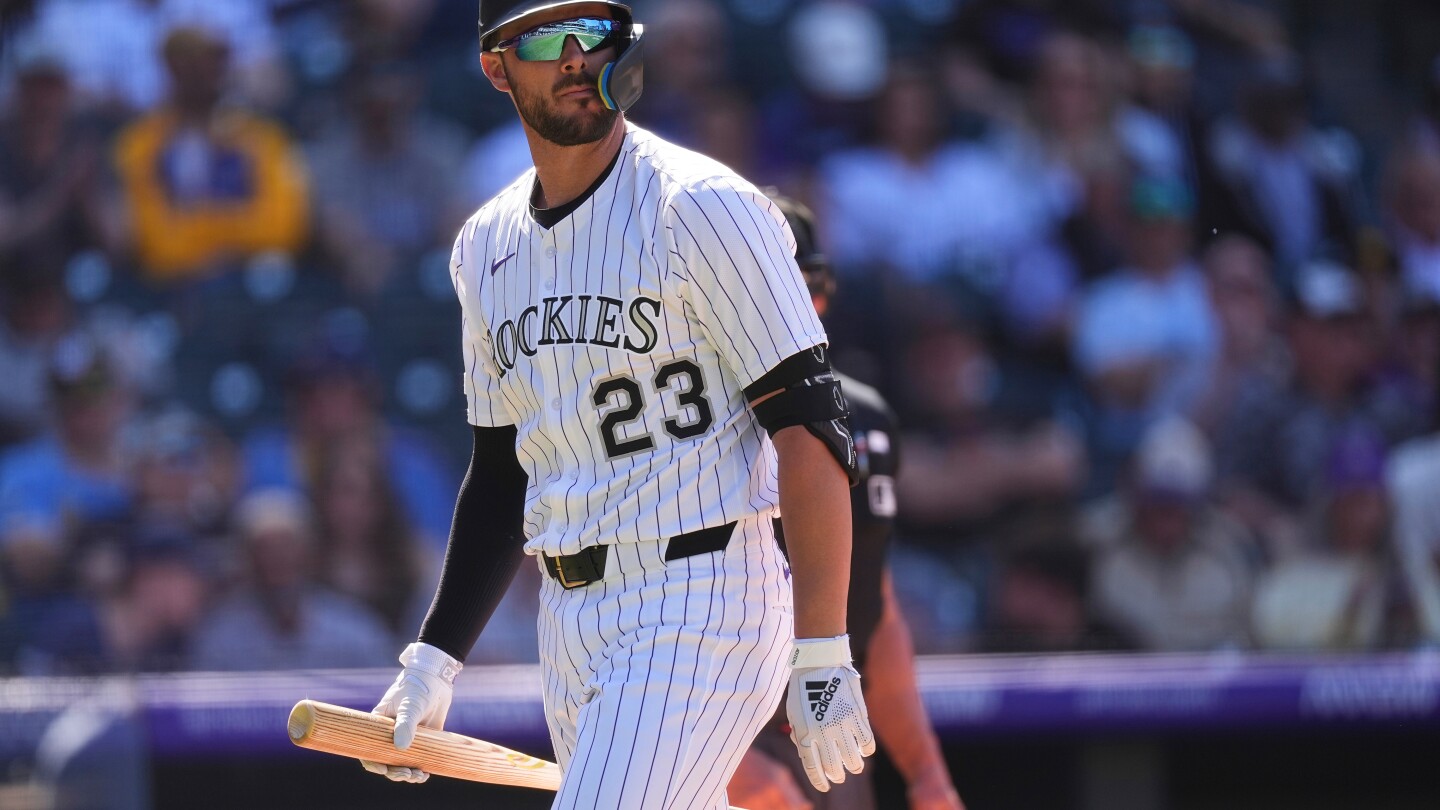 Rockies designated hitter Kris Bryant recovering from procedure on back, no timetable for return