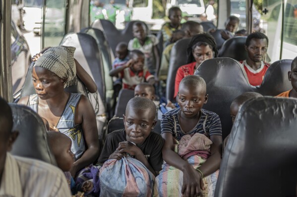 Hundreds of Rwandan refugees who were living in eastern Congo since the 1994 Rwanda genocide are repatriated by bus from Goma, Democratic Republic of the Congo, on Saturday, May 17, 2025. (AP Photo/Moses Sawasawa)
