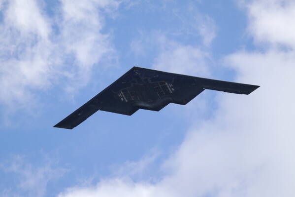 A B-2 Spirit stealth bomber, assigned to the 509th/131st Bomb Wings out of Whiteman Air Force Base, performs a flyover of Barnes-Jewish Hospital May 8, 2020, in St. Louis. (AP Photo/Jeff Roberson, File)
