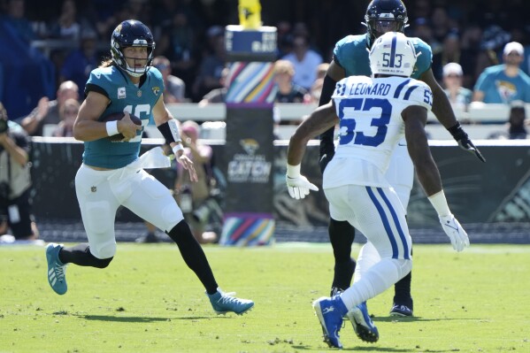 Jaguars QB Trevor Lawrence feels optimistic about playing at the Saints  despite sprained knee | AP News