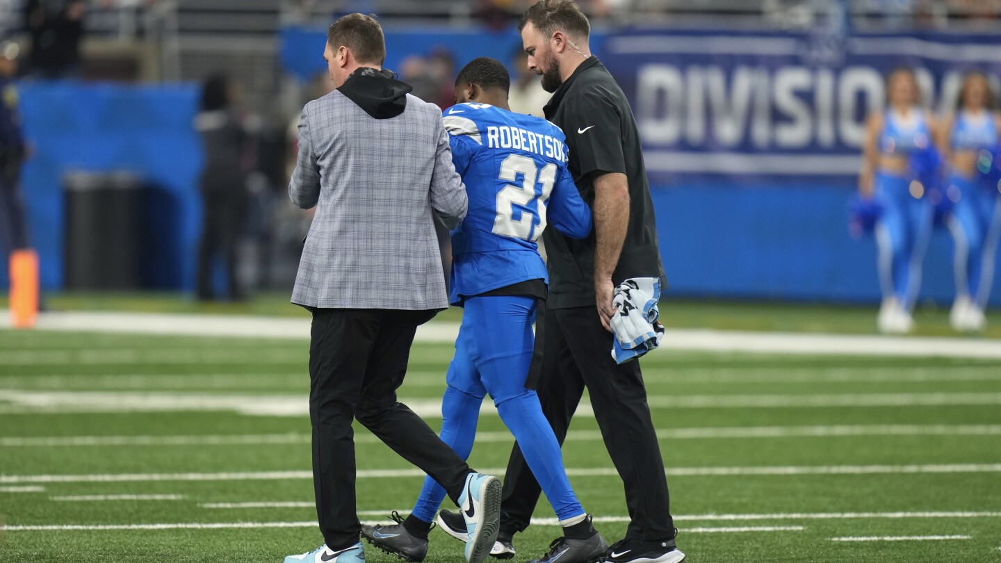 Amik Robertson Leaves Game with Elbow Injury