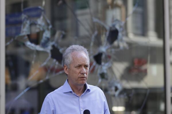 FILE - Louisville Mayor Greg Fischer speaks during a news conference, May 30, 2020, in Louisville, Ky. Fischer was punched in the city's Fourth Street Live! entertainment district on Saturday night, June 18, 2022. (AP Photo/Darron Cummings)