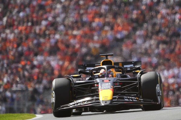 FILE - Red Bull driver Max Verstappen of the Netherlands steers his car during the Formula One Dutch Grand Prix race at the Zandvoort racetrack, Netherlands, Sunday, Aug. 25, 2024. (AP Photo/Peter Dejong, File)