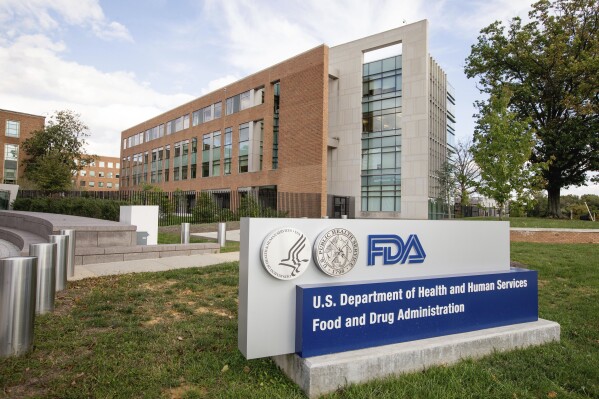 FILE - The U.S. Food and Drug Administration campus in Silver Spring, Md., is photographed on Oct. 14, 2015. The FDA on Thursday, June 22, 2023, said it has sent warning letters to dozens of retailers selling fruit- and candy-flavored disposable e-cigarettes, including the current best-selling brand, Elf Bar. It’s the latest attempt by regulators to crack down on illegal disposable vapes that have poured into U.S. stores in recent years. (AP Photo/Andrew Harnik, File)