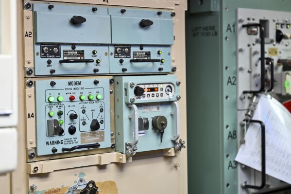 This August 2023 photo provided by the U.S. Air Force shows one of the seafoam green control panels inside an underground launch control capsule at F.E. Warren Air Force Base in Wyoming. (Joseph Coslett Jr./U.S. Air Force via AP)