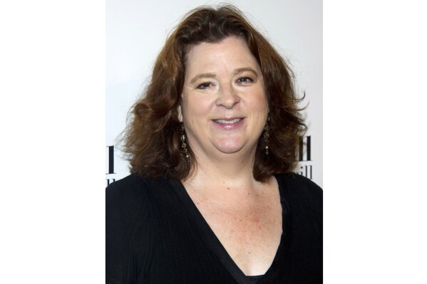 FILE - Playwright Theresa Rebeck attends the Eugene O'Neill Theater Center's 12th Annual Monte Cristo Awards in New York on April 16, 2012. Rebeck will direct her own work “Dig” at 59E59 Theaters and her “I Need That” is landing on Broadway starring Danny DeVito and his daughter, Lucy. (AP Photo/Charles Sykes, File)