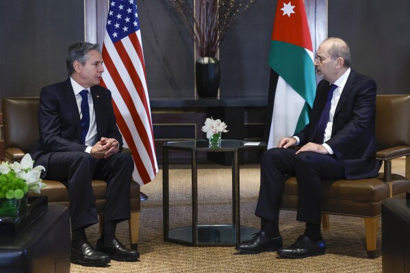 U.S. Secretary of State Antony Blinken, left, meets with Jordanian Foreign Minister Ayman Safadi in Amman, Jordan Sunday, Jan. 7, 2024. (Evelyn Hockstein/Pool Photo via AP)