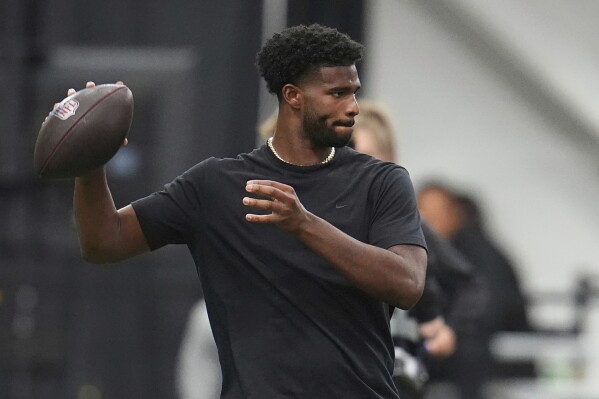 Colorado quarterback Shedeur Sanders (2) takes part in passing drills during Colorado's NFL football pro day Friday, April 4, 2025, in Boulder, Colo. (AP Photo/David Zalubowski,File)