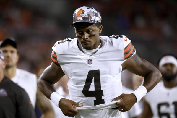 FILE - Cleveland Browns quarterback Deshaun Watson walks off of the field during an NFL preseason football game against the Chicago Bears, Saturday Aug. 27, 2022, in Cleveland. NFL Commissioner Roger Goodell said suspended quarterback Watson has met the requirements of his settlement with the league to this point after being accused of sexual misconduct by two dozen women. (AP Photo/Kirk Irwin, File)