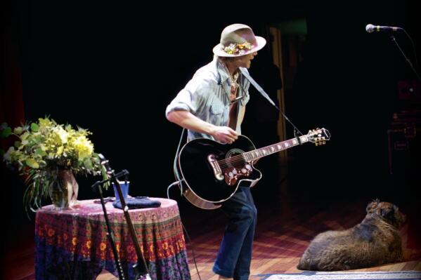 This image released by Aimless Records/Thirty Tigers shows "Live: Return of the Storyteller" by Todd Snider. (Aimless Records/Thirty Tigers via AP)
