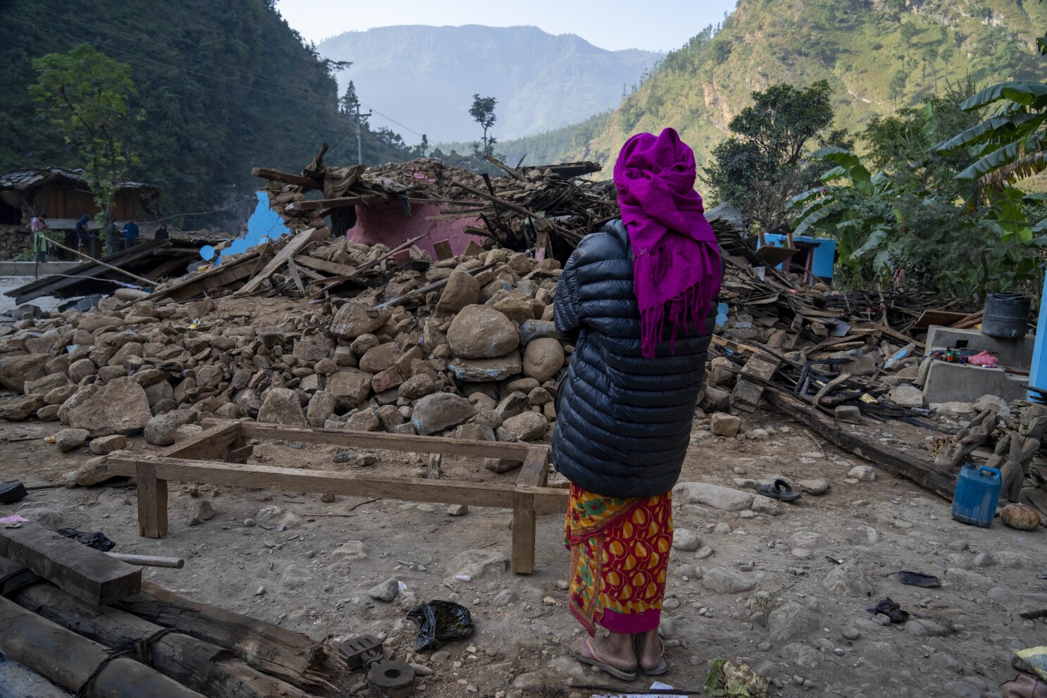 Aid trickles in as survivors salvage belongings from rubble in Nepal  villages struck by earthquake | AP News