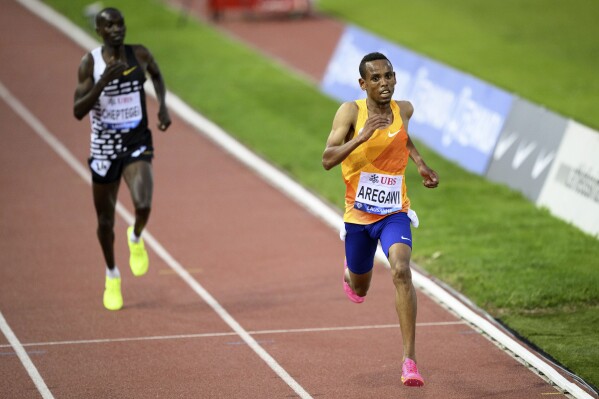 meters fifth-fastest win at 5,000 AP News meet men\'s history in to | Diamond Aregawi League Lausanne clocks