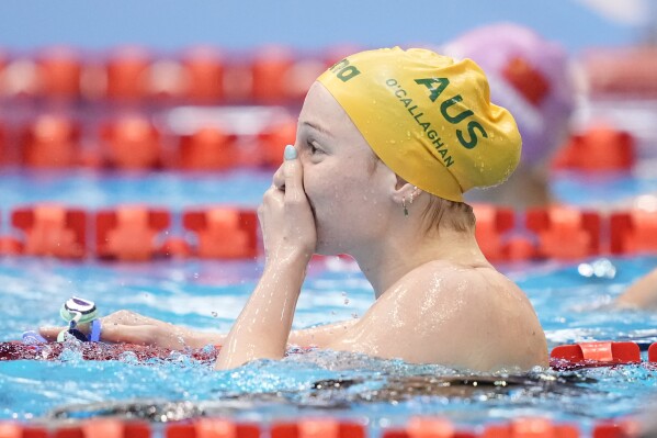 Mollie O'Callaghan of Australia reacts after winning the women's 200m freestyle swimming final at the World Swimming Championships in Fukuoka, Japan, Wednesday, July 26, 2023. (AP Photo/Eugene Hoshiko)