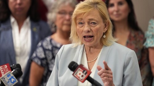 Maine Gov. Janet Mills speaks to the media prior to signing into law a bill expanding access to abortions later in pregnancy, Wednesday, July 19, 2023, at the State House in Augusta, Maine. (AP Photo/Robert F. Bukaty)