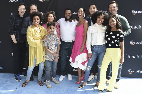 FILE - In this April 28, 2018 file photo, the cast of "black-ish" attends a For Your Consideration event in Burbank, Calif. Pictured from left are Nelson Franklin, Peter Mackenzie, Jenifer Lewis, Miles Brown, Anna Deavere Smith, Anthony Anderson, Tracee Ellis Ross, Marcus Scribner, Yara Shahidi, Marsai Martin and Jeff Meacham. ABC is bringing back the lion’s share of its series for next season, including “black-ish,” “A Million Little Things” and “The Rookie.” Those are among the shows that will return in the 2020-21 season, the network said Thursday, adding to the list of previously announced renewals for a total so far of 19. (Photo by Richard Shotwell/Invision/AP, File)