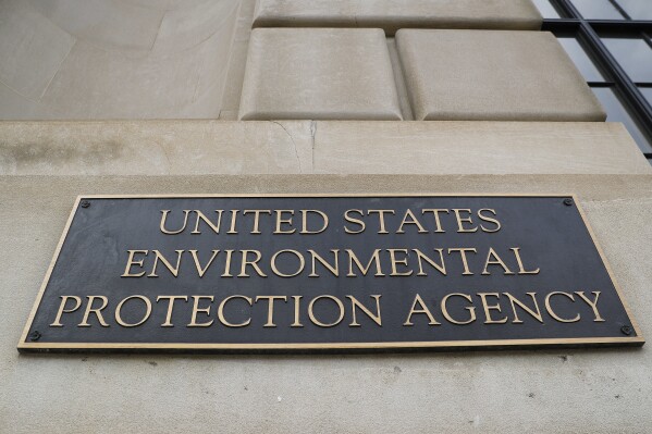FILE - The Environmental Protection Agency (EPA) Building is shown in Washington, Sept. 21, 2017. The Biden administration says it's expanding a program to help rural communities with serious sewage problems get technical help to plan improvements and apply for funding. The Environmental Protection Agency said Tuesday that 150 more communities will be able to apply for assistance, in addition to 11 chosen in 2022 for a pilot program.(AP Photo/Pablo Martinez Monsivais, File)