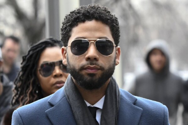 FILE - In this March 14, 2019, file photo, Empire actor Jussie Smollett arrives at the Leighton Criminal Court Building for his hearing in Chicago. Smollett faces new charges for reporting an attack that Chicago authorities contend was staged to garner publicity, according to media reports Tuesday, Feb. 11, 2020. The charges include disorderly conduct counts, according to the reports that cite unidentified sources.  (AP Photo/Matt Marton, File)