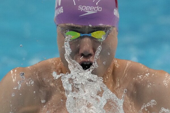 China's Qin Haiyang competes during the men's 4x100m medley relay swimming final at the 19th Asian Games in Hangzhou, China, Tuesday, Sept. 26, 2023. (AP Photo/Lee Jin-man)