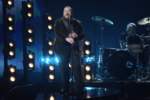Luke Combs performs "Fast Car" during the 66th annual Grammy Awards on Sunday, Feb. 4, 2024, in Los Angeles. (AP Photo/Chris Pizzello)