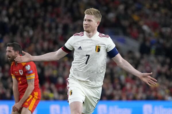 Belgium's Kevin De Bruyne celebrates after scoring his side's opening goal during the World Cup 2022 group E qualifying soccer match between Wales and Belgium at Cardiff City stadium in Cardiff, Wales, Tuesday, Nov. 16, 2021. (AP Photo/Frank Augstein)