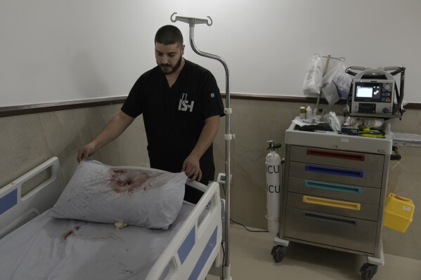 Israeli forces dressed as civilian women and medics kill 3 militants in a West Bank hospital