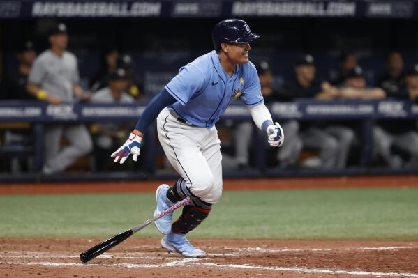Tampa Bay Rays' Yu Chang watches his two-run single against the New York Yankees during the eighth inning a baseball game Friday, Sept. 2, 2022, in St. Petersburg, Fla. (AP Photo/Scott Audette)