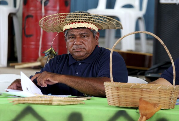 Aldinelson Moraes Pavao, a leader of the Mura Indigenous Council, attends an assembly with members of the Mura community, in Autazes, Amazonas state, Brazil, Wednesday, Feb. 19, 2025. (AP Photo/Edmar Barros)