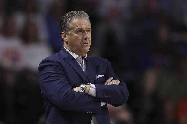 University of Kentucky men's basketball head coach John Calipari stands on the sidelines during the first half of the team's NCAA college basketball game against Florida, March 5, 2022, in Gainesville, Fla. Kentucky will play its annual Blue-White men’s basketball scrimmage in eastern Kentucky to benefit victims from devastating summer floods in the region. The school announced that the Oct. 22 event at Appalachian Wireless Arena in Pikeville will feature a pregame Fan Fest. Ticket proceeds will go through Team Eastern Kentucky Flood Relief. (AP Photo/Matt Stamey, File)