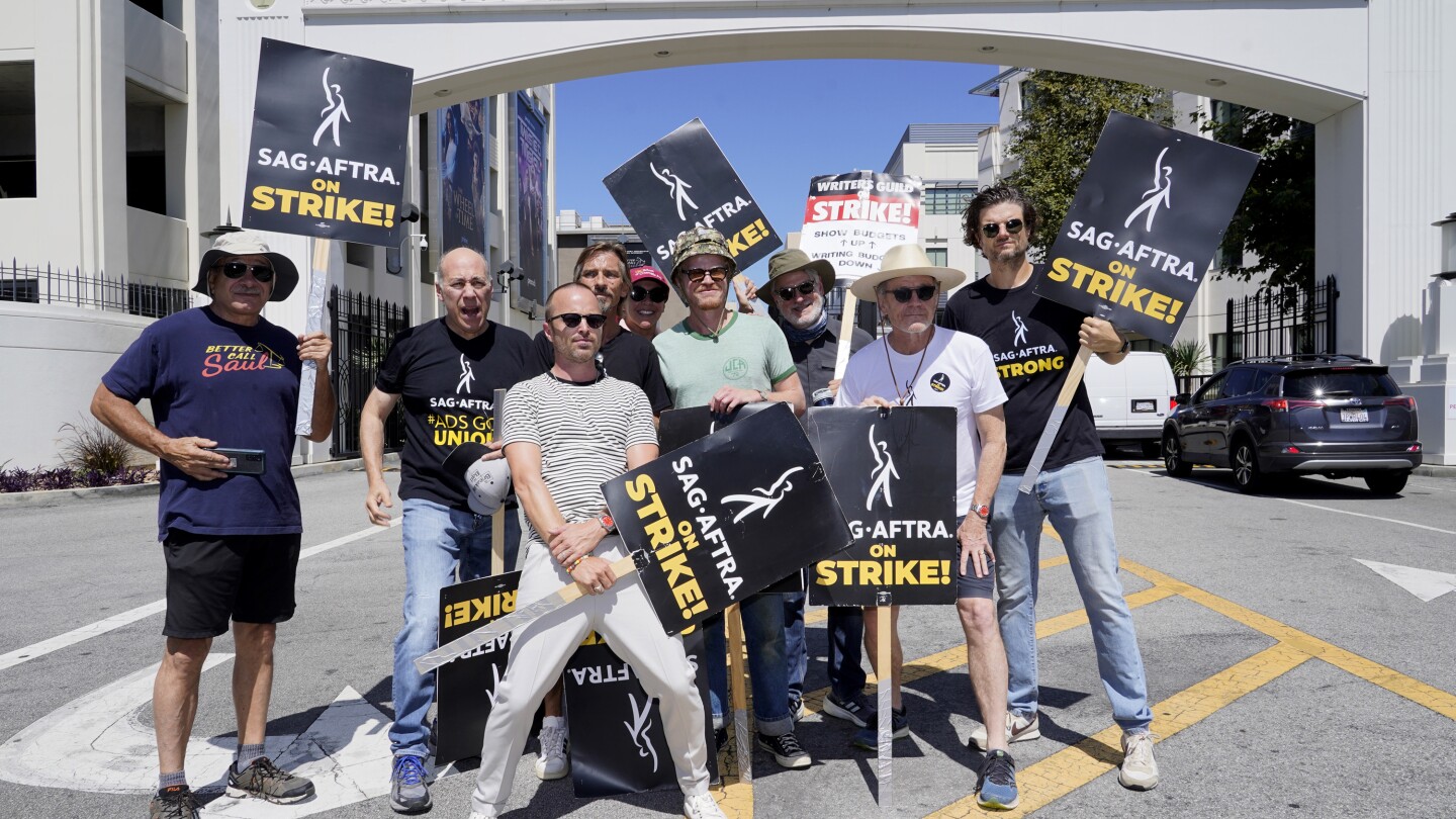 ‘Breaking Bad’ stars reunite on picket line to call for studios to resume negotiations with actors